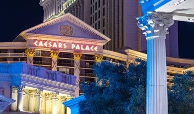 A picture of the Caesars Palace at night