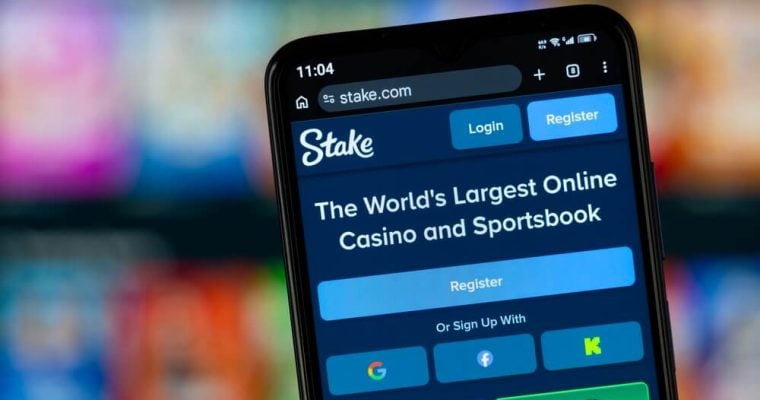 Close-up of Stake's homepage on a smartphone