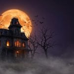 Haunted Victorian mansion with bats