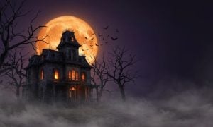 Haunted Victorian mansion with bats