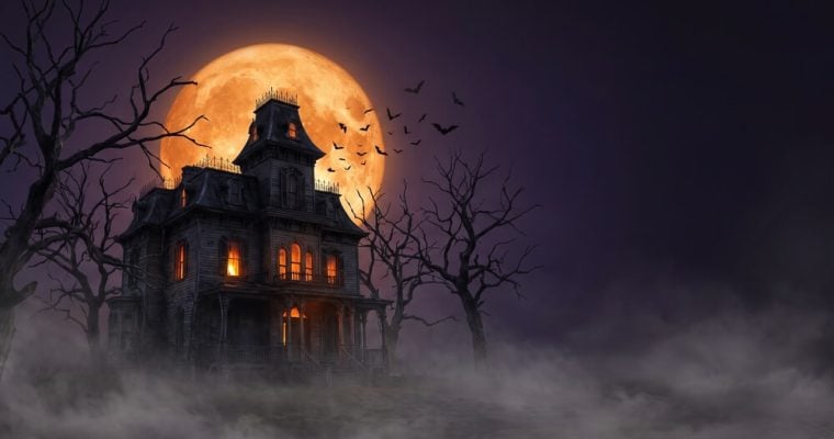 Haunted Victorian mansion with bats