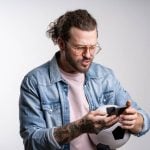 Man shocked and frustrated after losing soccer bet