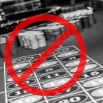 Roulette table with prohibition sign