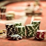 close up view of poker chips on table in casino