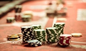 close up view of poker chips on table in casino