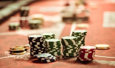 close up view of poker chips on table in casino
